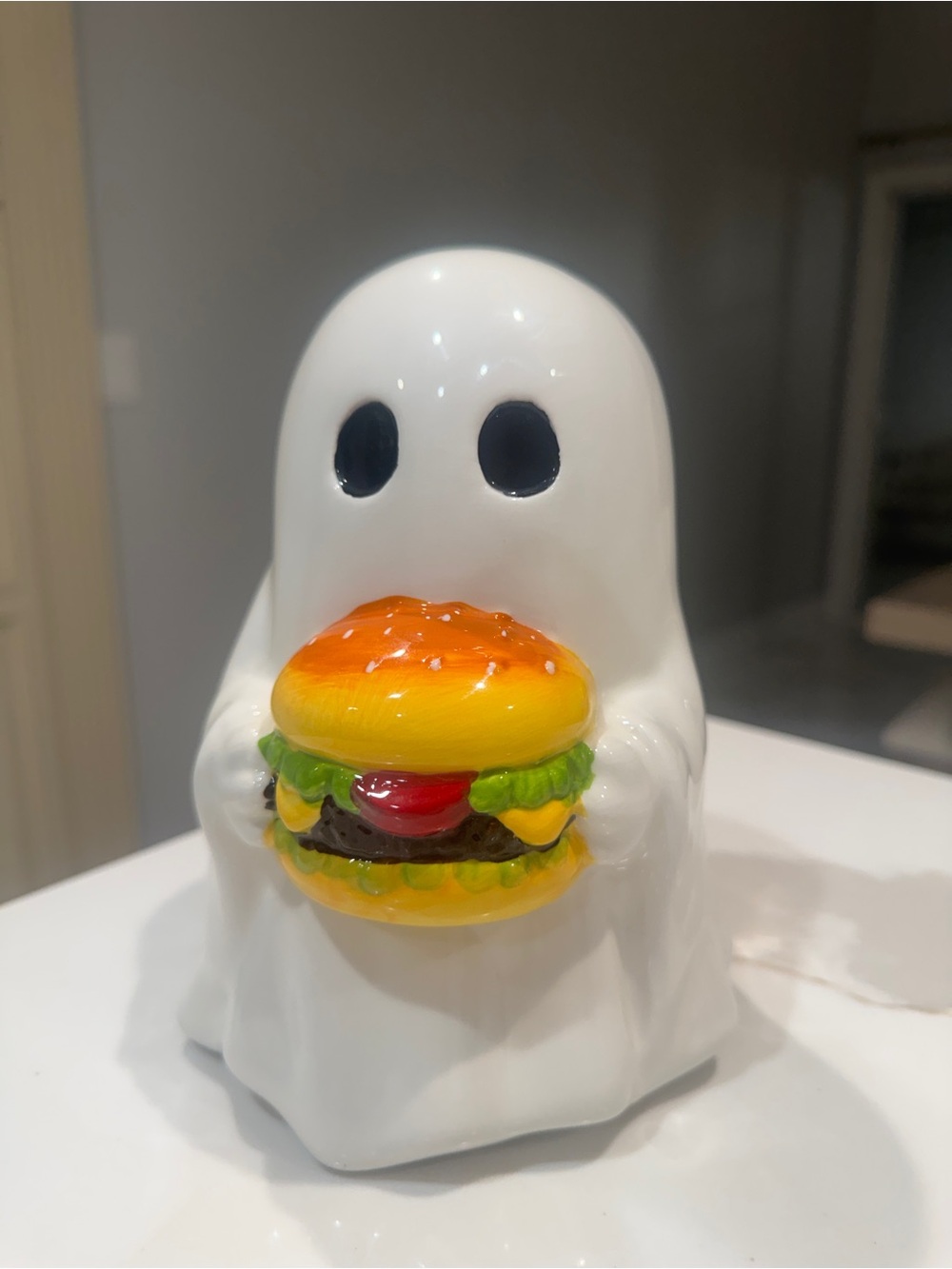 Halloween ghost with hamburger